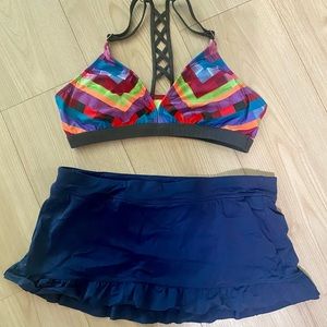 Women’s size L Title Nine swimsuit. Cute ruffled skirt and multicolored top